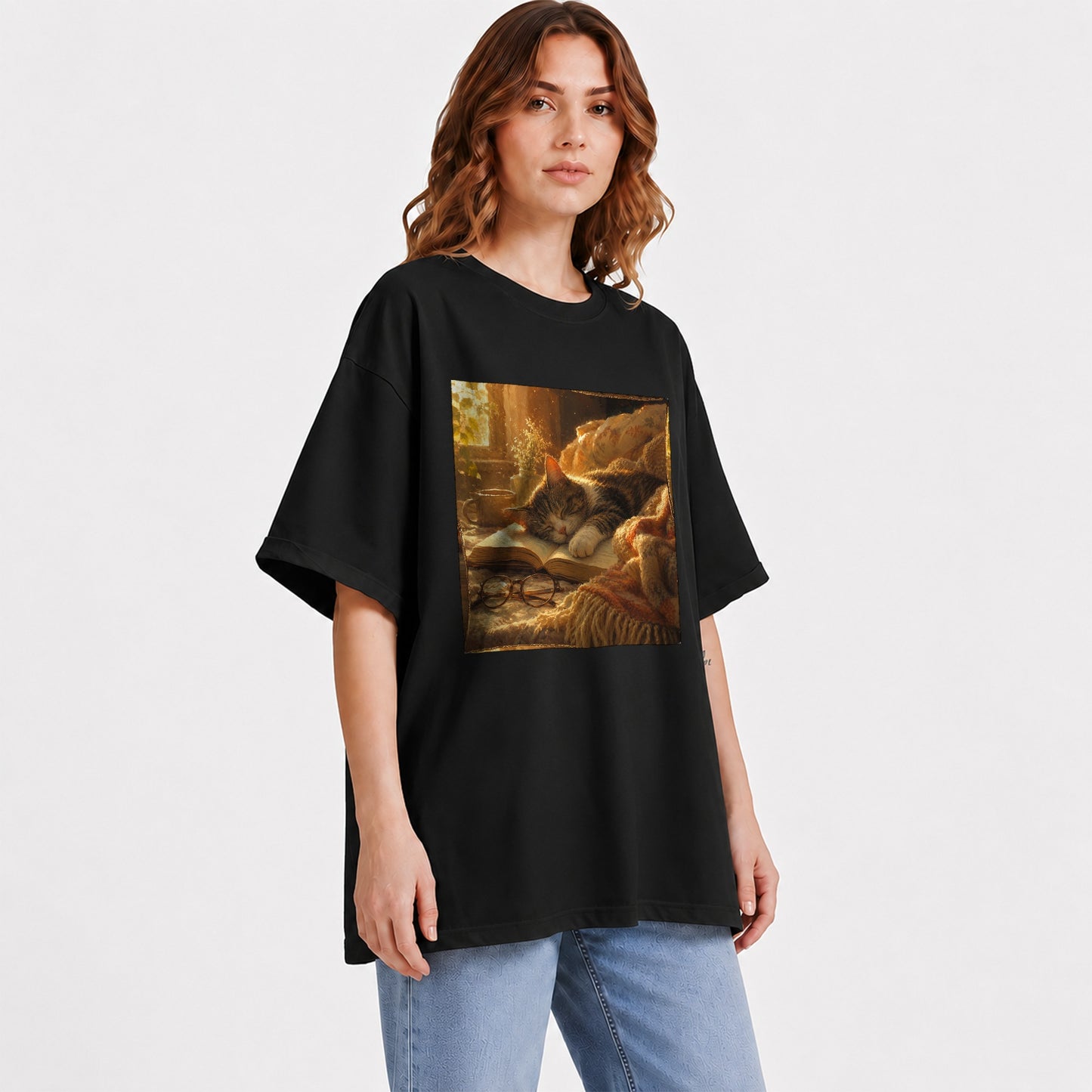 #pl[Black] Sleeping Cat Book Graphic T-Shirt, Cozy Reading Pet Design