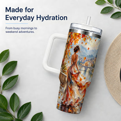 Autumn Riverside Woman 40oz Handled Tumbler with Scenic City Artwork
