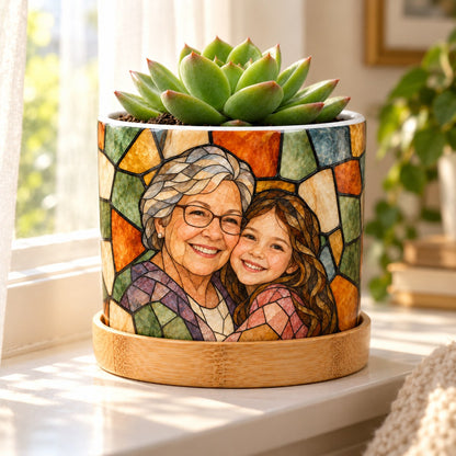 Stained glass plant pot on a sunny windowsill